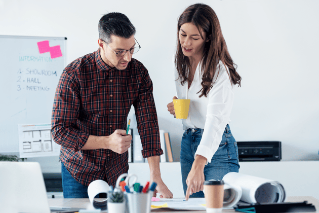 Two people working hard